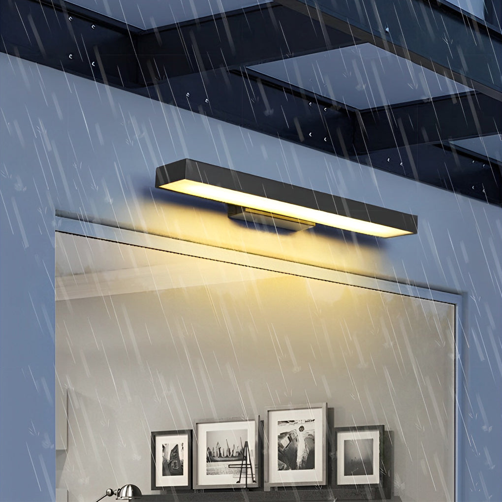 Aplique de pared de acero inoxidable negro para uso exterior.