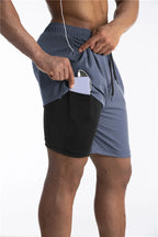 Titan | Gefütterte Laufshorts mit Handytasche - Komfort und Funktionalität