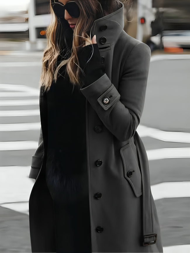 Stilvoller langer Damenmantel mit hohem Kragen und elegantem Schleifengürtel