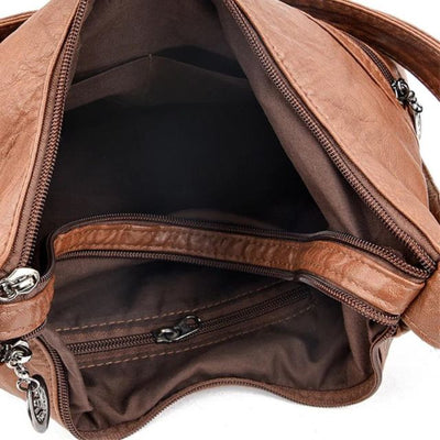 Vintpack - Nietenbesetzter Lederrucksack - Ideal für Schule und Reise - Reisedetail - Kompakt