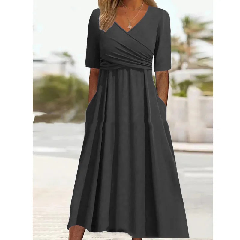 Olivia - schlichtes schwarzes Midikleid mit Seitentaschen