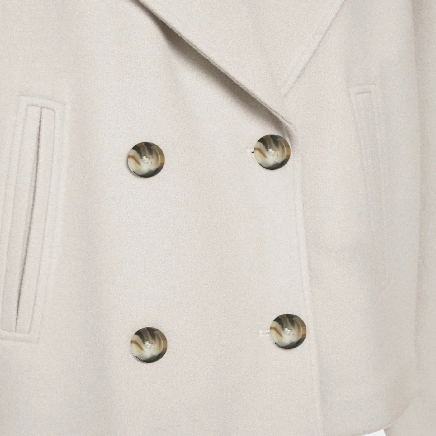 Minimalistisk, skräddarsydd damjacka - modern struktur, enkel elegans