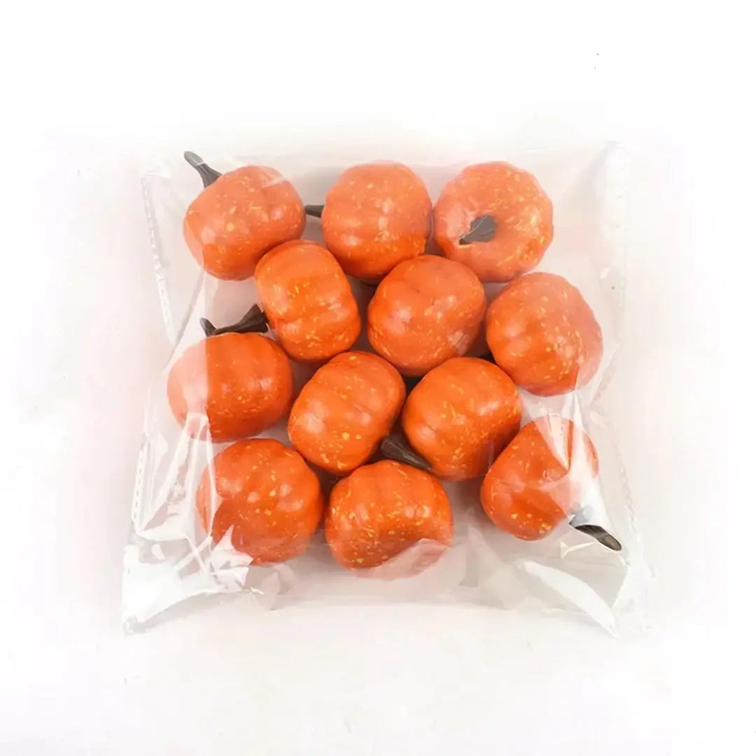 Juego de decoración de 12 piezas con hojas de arce otoñal y calabazas.