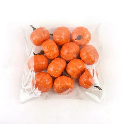 Juego de decoración de 12 piezas con hojas de arce otoñal y calabazas.